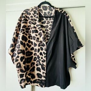 Beautiful Leopard Print Button Front Flowy blouse, never worn. Size 2x